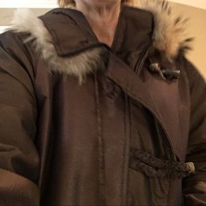 Brown coat with fur trimmed hood